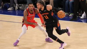 New York Knicks' Jalen Brunson (11) dribbles the ball against New Orleans Pelicans' Dejounte Murray (5) during the second half of an NBA basketball game Tuesday, March 24, 2026, in New York. (Pamela Smith/AP)
