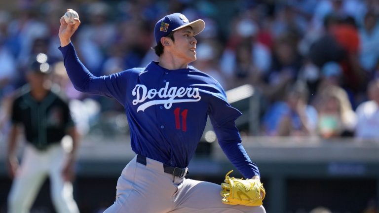 Los Angeles Dodgers starting pitcher Roki Sasaki throws against the Arizona Diamondbacks during the first inning of a spring training baseball game Wednesday, Feb. 25, 2026, in Scottsdale, Ariz. (Ross D. Franklin/AP)