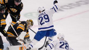Boston Bruins goaltender Jeremy Swayman (1) makes the save on a shot by Toronto Maple Leafs center Bo Groulx (29) during the first period of an NHL hockey game, Tuesday, March 24, 2026, in Boston. (Charles Krupa/AP)