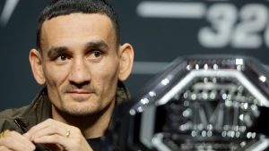 UFC lightweight fighter and BMF titleholder Max Holloway attends a news conference for UFC 326 at MGM Grand Garden Arena in Las Vegas. (Steve Marcus/Las Vegas Sun via AP)