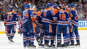Edmonton Oilers players celebrate the win over the Ottawa Senators in overtime NHL action, in Edmonton on Tuesday, March 3, 2026. (Jason Franson/CP)