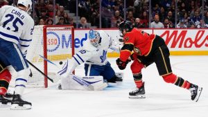 Ottawa Senators' Claude Giroux (28) scores on Toronto Maple Leafs goaltender Joseph Woll (60) during second period NHL hockey action in Ottawa, on Saturday, Mar. 21, 2026. (Justin Tang/CP)