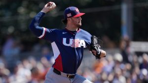 United States starting pitcher Paul Skenes throws against the San Francisco Giants during the first inning of an exhibition baseball game Tuesday, March 3, 2026, in Scottsdale, Ariz. (AP Photo/Ross D. Franklin)
