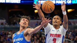 Orlando Magic forward Tristan da Silva (23) and Detroit Pistons guard Ausar Thompson (9) go after a rebound during the first half of an NBA basketball game, Sunday, March 1, 2026, in Orlando, Fla. (AP Photo/John Raoux)