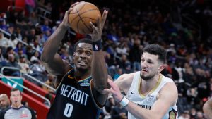 Detroit Pistons center Jalen Duren (0) goes to the basket against New Orleans Pelicans forward Karlo Matkovic (17) during the first half of an NBA basketball game Thursday, March 26, 2026, in Detroit. (AP Photo/Duane Burleson)