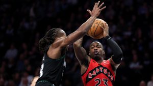 Toronto Raptors guard Jamal Shead, right, goes up for a shot as Minnesota Timberwolves guard Ayo Dosunmu defends during the first half of an NBA basketball game, Thursday, March 5, 2026, in Minneapolis. (Matt Krohn/AP)