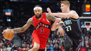 Toronto Raptors forward Brandon Ingram (3) moves the ball up court as Detroit Pistons guard Kevin Huerter (27) defends during first half NBA basketball action in Toronto on Sunday, March 15, 2026. (Frank Gunn/CP)