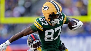 Green Bay Packers wide receiver Romeo Doubs is tackled by New York Giants cornerback Korie Black during an NFL game Sunday, Nov. 16, 2025, in East Rutherford, N.J. (AP/Adam Hunger)