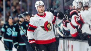 Ottawa Senators defenceman Tyler Kleven celebrates with teammates on the bench after a goal during the first period of an NHL hockey game against the Seattle Kraken, Saturday, March 7, 2026, in Seattle. (Stephen Brashear/AP)