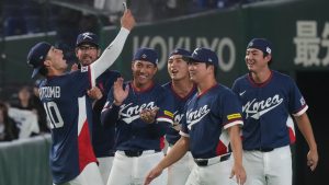 South Korea players celebrate after defeating Australia in their World Baseball Classic game on Monday, March 9, 2026, in Tokyo. (Eugene Hoshiko/AP)