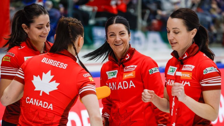 Team Canada, left to right, second Shannon Birchard, lead Karlee Burgess, skip Kerri Einarson and third Val Sweeting celebrate scoring three in the first end against Japan in the semifinal at the World Women's Curling Championship in Calgary, Saturday, March 21, 2026. (Jeff McIntosh/CP)