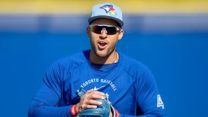 Toronto Blue Jays' George Springer calls to teammates as he heads to the outfield at Spring Training in Dunedin, Fla., on Tuesday, Feb. 17, 2026. (Frank Gunn/CP)