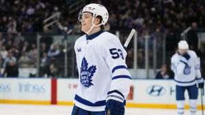 Toronto Maple Leafs' Easton Cowan (53) smiles after scoring a goal during the second period of an NHL hockey game against the New York Rangers Thursday, March 5, 2026, in New York. (Frank Franklin II/AP)