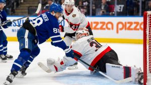 Toronto Maple Leafs right wing William Nylander (88) scores on Ottawa Senators goaltender Linus Ullmark (35) as defenseman Tyler Kleven (43) looks on during second period NHL hockey action in Toronto, Saturday, Feb 28, 2026. (Frank Gunn/CP)