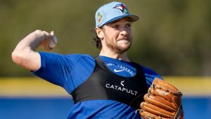 Toronto Blue Jays pitcher Trey Yesavage makes a throw to first base during a drill at Spring Training in Dunedin, Fla., on Monday, Feb. 16, 2026. (Frank Gunn/CP)