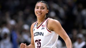 UConn guard Azzi Fudd (35) reacts after making another 3-point basket during the first half in the second round of the NCAA college basketball tournament against Syracuse, Monday, March 23, 2026, in Storrs, Conn. (AP Photo/Jessica Hill)