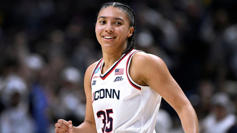 UConn guard Azzi Fudd (35) reacts after making another 3-point basket during the first half in the second round of the NCAA college basketball tournament against Syracuse, Monday, March 23, 2026, in Storrs, Conn. (AP Photo/Jessica Hill)