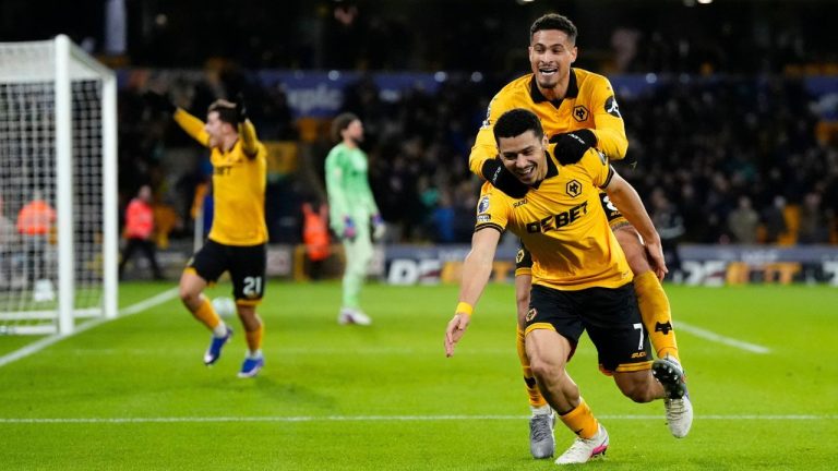 Wolverhampton Wanderers' Andre, front right, celebrates after scoring their second goal of the game during an English Premier League match against Liverpool, Tuesday, March 3, 2026, in Wolverhampton, England. (Nick Potts/PA via AP)