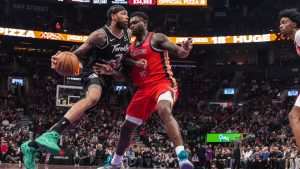 Toronto Raptors Brandon Ingram (3) drives at New Orleans Pelicans Yves Missi (21) during first half NBA basketball action in Toronto on Friday, March 27, 2026. THE CANADIAN PRESS/Chris Young