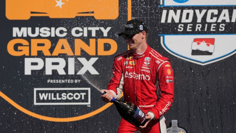 Josef Newgarden celebrates after winning an IndyCar auto race Sunday, Aug. 31, 2025, at Nashville Superspeedway in Lebanon, Tenn. (AP Photo/George Walker IV)