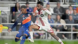 FC Cincinnati forward Ender Echenique (66) and Toronto FC defender Raheem Edwards (44) battle for the ball during the first half of an MLS soccer match in Cincinnati, Sunday, March 8, 2026. (Photo by Carolyn Kaster/AP)