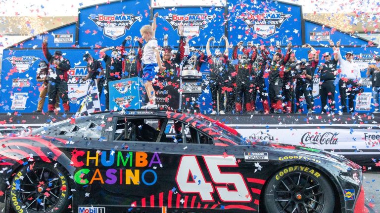 23XI Racing's Tyler Reddick, front right, celebrates with his son Beau Reddick, front left, after winning a NASCAR Cup Series auto race in Austin, Texas, Sunday, March 1, 2026. (AP Photo/Stephen Spillman)