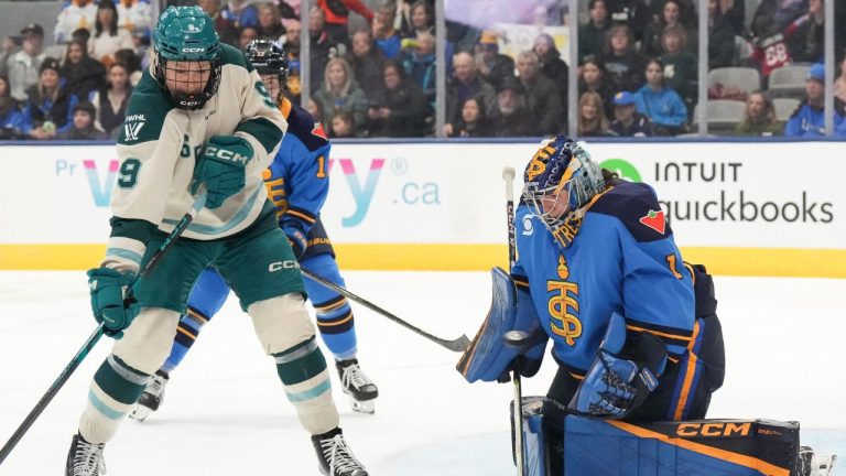 Toronto Sceptres goaltender Raygan Kirk (1) makes a save in front of Seattle Torrent's Jessie Eldridge (9) during third period PWHL hockey action in Toronto on Sunday March 15, 2026. THE CANADIAN PRESS/Chris Young