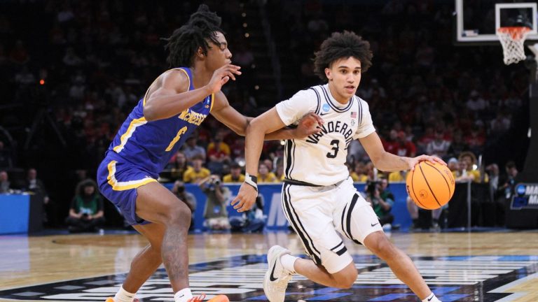 Vanderbilt guard Tyler Tanner (3) drives against McNeese guard Larry Johnson, left, during the second half in the first round of the NCAA college basketball tournament, Thursday, March 19, 2026, in Oklahoma City. (AP Photo/Nate Billings)