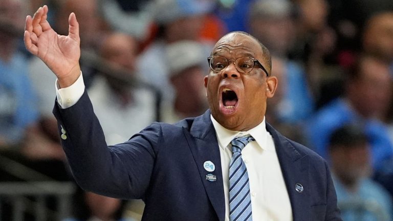 North Carolina head coach Hubert Davis yells during the second half against VCU in the first round of the NCAA college basketball tournament, Thursday, March 19, 2026, in Greenville, S.C. (AP Photo/Chris Carlson)