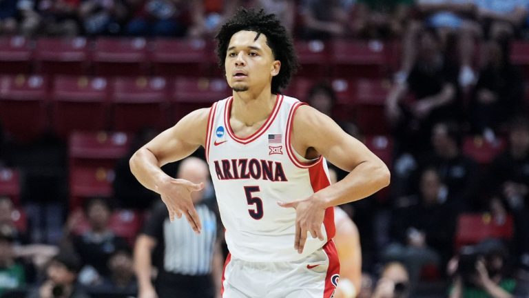 Arizona guard Brayden Burries (5) celebrates after scoring against LIU during the first half in the first round of the NCAA college basketball tournament, Friday, March 20, 2026, in San Diego. (AP Photo/Marcio Jose Sanchez)