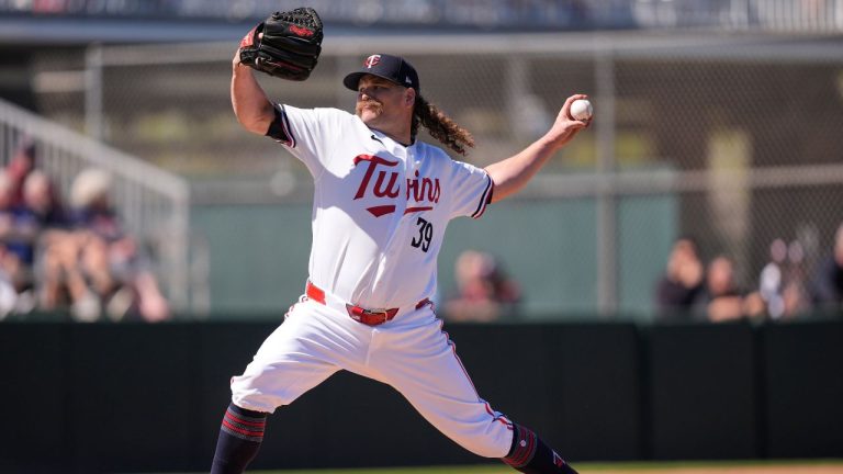 Minnesota Twins pitcher Andrew Chafin (39) delivers in the second inning of a spring training baseball game against the Boston Red Sox in Fort Myers, Fla., Wednesday, Feb. 25, 2026. (AP Photo/Gerald Herbert)