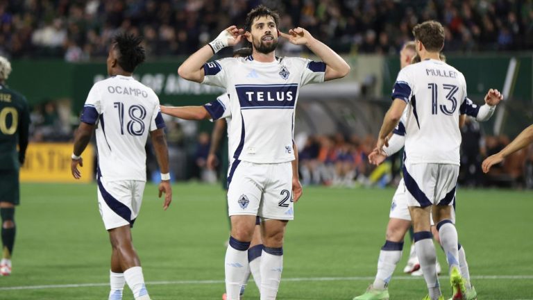 Vancouver Whitecaps forward Brian White (24) celebrates after scoring against the Portland Timbers during the first half of an MLS soccer match, Saturday, March 7, 2026, in Portland, Ore. (AP Photo/Amanda Loman)