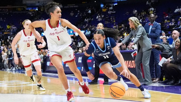 Villanova guard Jasmine Bascoe (11) goes to the basket against Texas Tech forward Jalynn Bristow (1) during the first half in the first round of the NCAA college basketball tournament, Friday, March 20, 2026, in Baton Rouge, La. (AP Photo/Gerald Herbert)