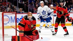Ottawa Senators goaltender Linus Ullmark (35) makes a pad save during first period NHL hockey action against the Toronto Maple Leafs in Ottawa, on Saturday, March 21, 2026. THE CANADIAN PRESS/Justin Tang