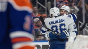 Tampa Bay Lightning's Brandon Hagel (38) and Nikita Kucherov (86) celebrate a goal against the Edmonton Oilers during third period NHL action, in Edmonton on Saturday March 21, 2026. THE CANADIAN PRESS/Jason Franson