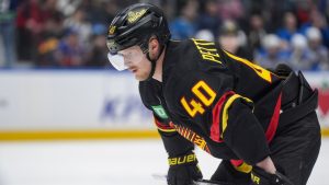 Vancouver Canucks' Elias Pettersson waits to take a faceoff during the third period of an NHL hockey game against the St. Louis Blues, in Vancouver, on Saturday, March 21, 2026. (Darryl Dyck/CP)