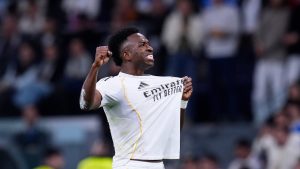 Real Madrid's Vinicius Junior celebrates after scoring his side's third goal during the Spanish La Liga match between Real Madrid and Atletico Madrid in Madrid, Spain, Sunday, March 22, 2026. (AP/Manu Fernandez)