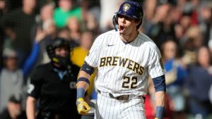 Milwaukee Brewers' Christian Yelich reacts to hitting a three-run home run during the eighth inning of a baseball game against the Chicago White Sox, Sunday, March 29, 2026, in Milwaukee. (Kayla Wolf/AP)