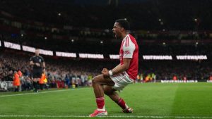 Arsenal's Jurrien Timber celebrates after scoring during the Premier League soccer match between Chelsea Arsenal in London Sunday, March 1, 2026. (Alastair Grant/AP)