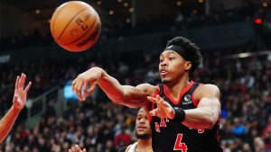 Toronto Raptors' Scottie Barnes (4) makes a pass against the Phoenix Suns during first half NBA basketball action in Toronto on Friday, March 13, 2026. (Frank Gunn/CP)