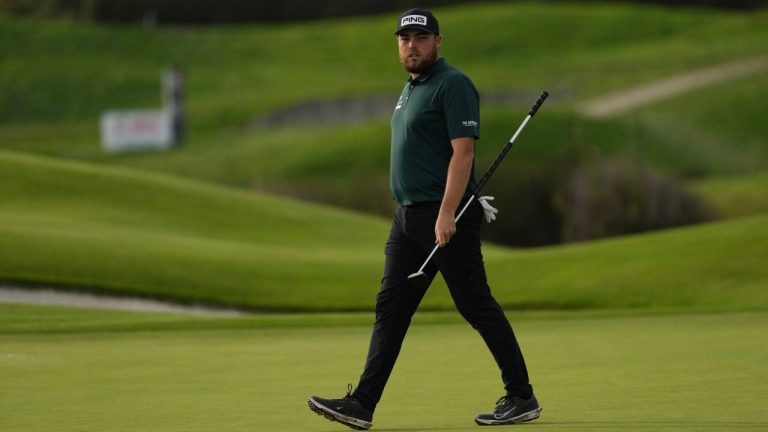 Dan Bradbury of England walks as he plays on the 18th hole during the Golf French Open at Le Golf National in Saint-Quentin-en-Yvelines, outside Paris, France, Sunday, Oct. 13, 2024. (Thibault Camus/AP)