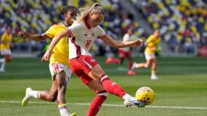 Canada forward Janine Sonis (16) kicks the ball past Colombia midfielder Linda Caicedo, left, during the second half of a SheBelieves Cup women's soccer tournament match Sunday, March 1, 2026, in Nashville, Tenn. (George Walker IV/AP)