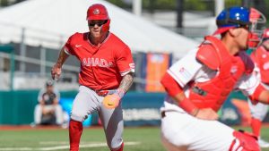 Canada's Tyler O'Neill runs toward home plate to score against Cuba during the third inning of a World Baseball Classic game in San Juan, Puerto Rico, Wednesday, March 11, 2026. (Fernando Llano/AP)