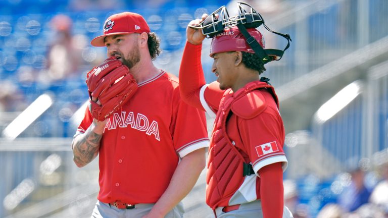 Canada pitcher Logan Allen, left, talks to catcher Bo Naylor during the first inning of an exhibition baseball game against the Toronto Blue Jays Tuesday, March 3, 2026, in Dunedin, Fla. (Chris O'Meara/AP)