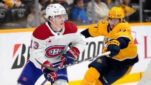 Montreal Canadiens right wing Cole Caufield (13) plays against the Nashville Predators during the second period of an NHL hockey game. (Mark Humphrey/AP)