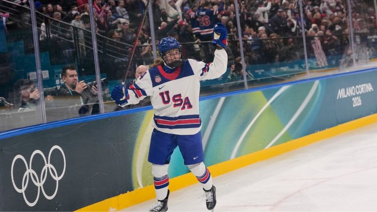 United States' Caroline Harvey celebrates after scoring her side's first goal during a preliminary round match of women's ice hockey between USA and Canada at the 2026 Winter Olympics, in Milan, Italy, Tuesday, Feb. 10, 2026. (Petr David Josek/AP)
