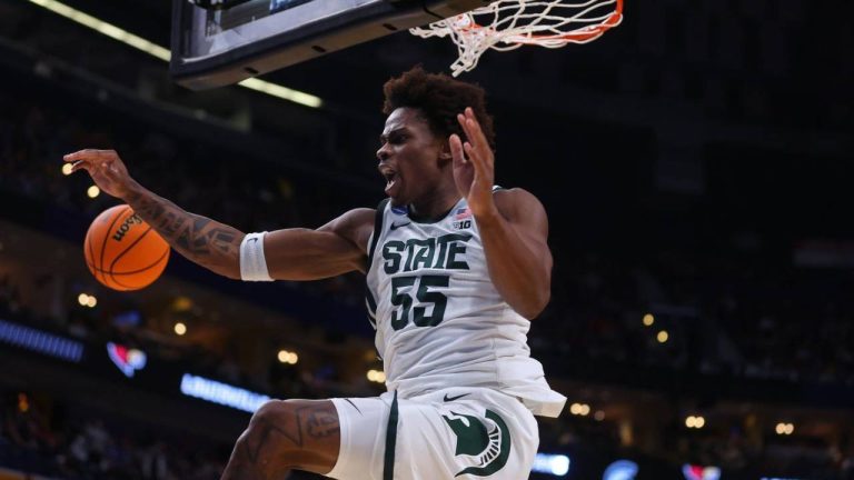 Michigan State forward Coen Carr celebrates after his dunk during the second half in the second round of the NCAA college basketball tournament against Louisville, Saturday, March 21, 2026, in Buffalo, N.Y. (Jeffrey T. Barnes/AP)
