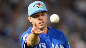 Toronto Blue Jays pitcher Chase Lee throws the ball to first baseman Sean Keys in time to get New York Yankees' Ryan McMahon out during the fourth inning of a spring training baseball game Wednesday, March 11, 2026, in Tampa, Fla. (Chris O'Meara/AP)