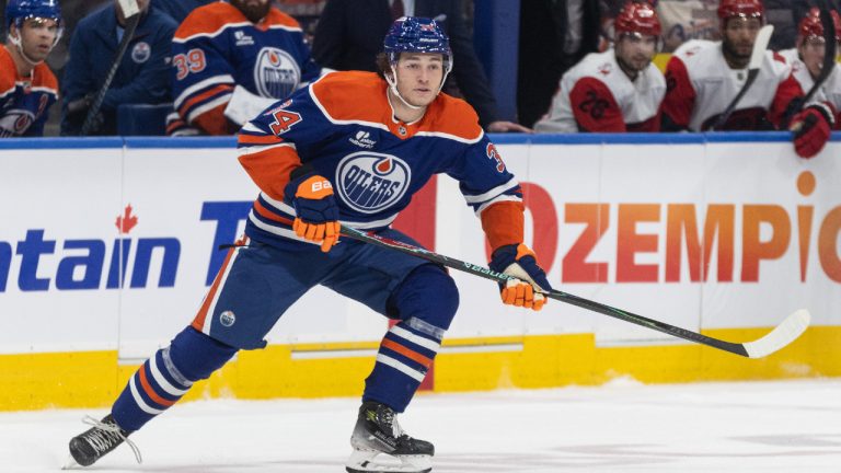 Edmonton Oilers' Colton Dach (34) skates against the Carolina Hurricanes during second period NHL action, in Edmonton on Friday March 6, 2026. (Jason Franson/CP)