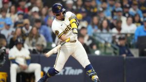Milwaukee Brewers' William Contreras hits a three-run double during the second inning of an opening-day baseball game against the Chicago White Sox, Thursday, March 26, 2026, in Milwaukee. (Kayla Wolf/AP)
